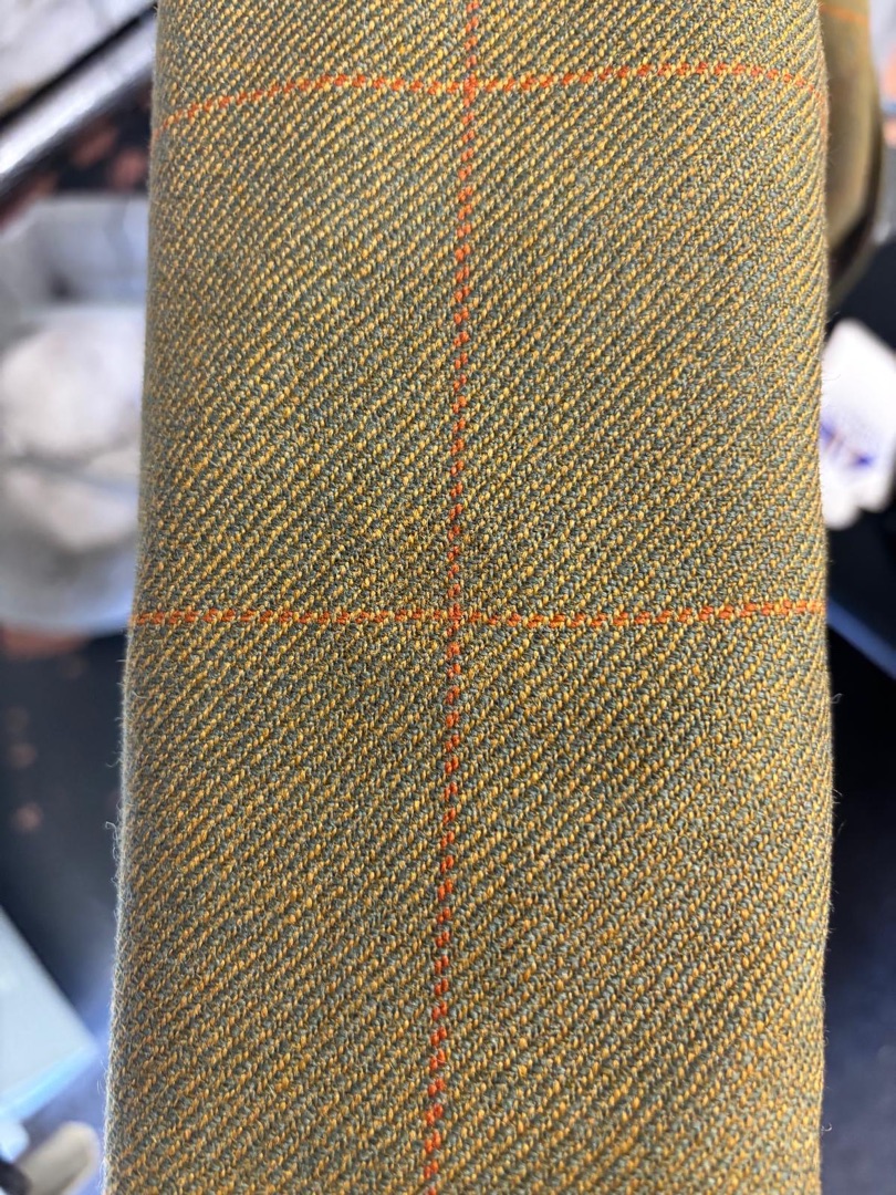 Tweed jacket after invisible mend